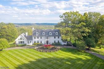 Stunning estate includes pool and cabana house