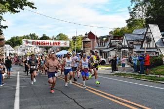 More than 320 people register for the eighth annual Askin &amp; Hooker Labor Day run/walk Monday, Sept. 1 in Sparta. (Photos by Maria Kovic)