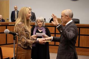 SC1 Neill Clark is sworn in as mayor of Sparta at the Township Council’s reorganization meeting Thursday, Jan. 4. (Photos by Dave Smith)