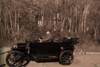 Students photograph classic car in antiquing project