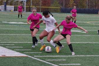 GS1 Hunterdon Central and Sparta players battle for control of the ball in the finals of the Hunterdon/Warren/Sussex Tournament on Saturday, Oct. 21. Sparta won, 2-0, bringing home the title for the first time in school history. (Photo by George Leroy Hunter)