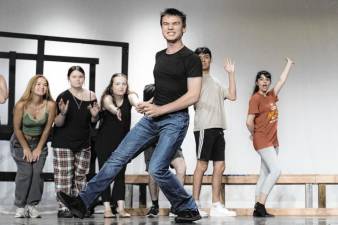 <b>Logan Frazer, front, as Nigel Bottom with dancers, front left, Maddy Sutton, Hayley Frazer, Blair Lanza, Thomas Fossett and Madisyn Rojas rehearse a dance number from ‘Something Rotten!’ (Photo provided)</b>