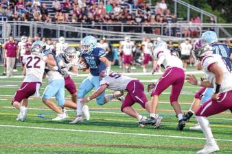 <b>Sparta ball carrier Brady Shagawat on the run in the first half of the game against Newton on Friday, Sept. 19. He made three touchdowns and rushed for 96 yards. The Spartans won, 35-20. (Photo by George Leroy Hunter)</b>