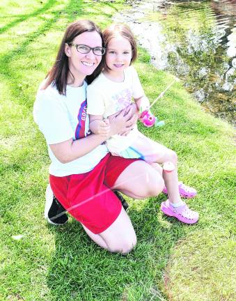 Faith and Iylah Muddiman pose for a photo.
