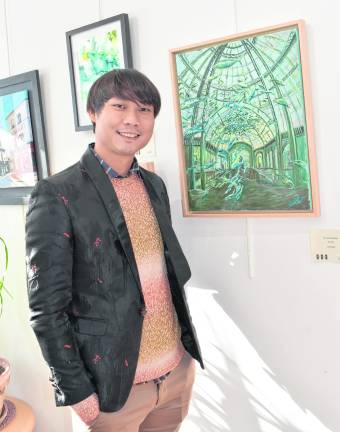 <b>Jax Kwok of Morristown poses in front of his painting, The Grand Dance.</b>