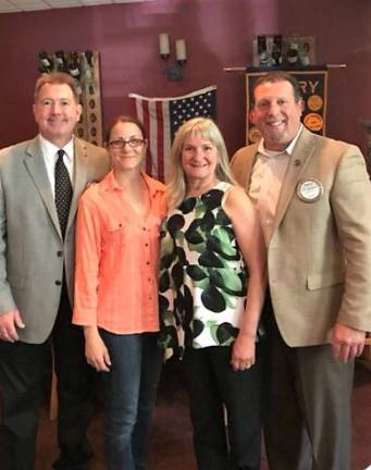 From left; John Roberts, President; Liza Nechamkin, new member; Denise Current, Sponsor; and Charles Grotyohann, Past President
