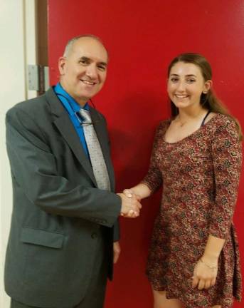 Roundtable President Roger Jinks and scholarship recipient Megan Canfield