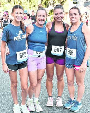 Farrah Whaley, Toni Cilli, Madison Guardians and Layne Cilli, all of Sparta, pose for a photo.