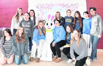 <b>The Vernon Softball team poses iwth the Easter Bunny.</b>