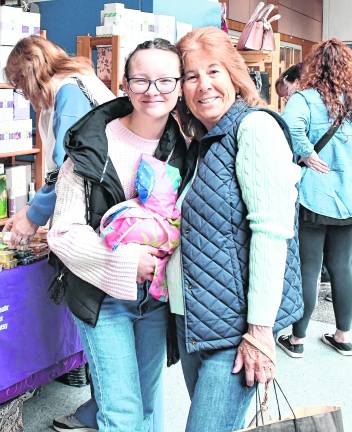 Mckenzie Bryant of Wharton and Ronnie Weston from Sparta step away from shopping.