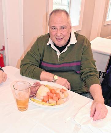 Erny Kovatch of West Milford is show iwth his food.