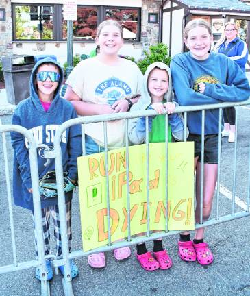 Jeffrey Salmon of Stanhope and Sophia, Joey and Lizzie Albensi of Netcong cheer on their cousin.