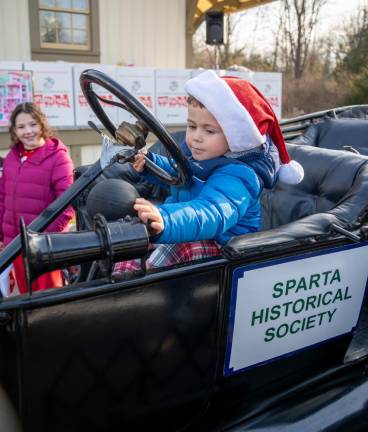 Sean Quinn of Byram sits in the Sparta Historical Society’s Ford Model T, which was part of the Touch-a-Truck display.