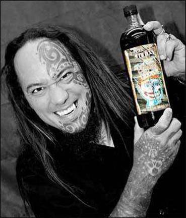 Tattoo artist touts his new drink at local wine store