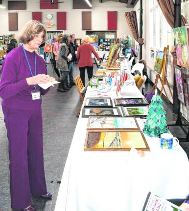 Attendees peruse the tables.