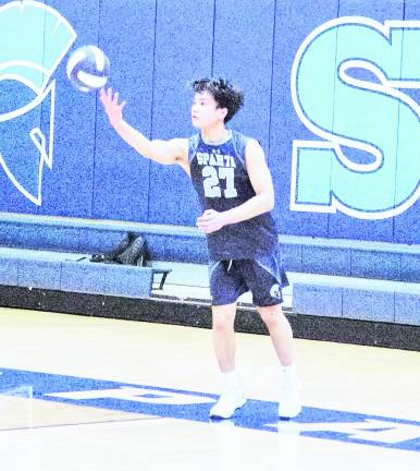 Sparta's Joshua Tolentino is about to serve. Tolentino had 9 kills, 3 digs and 1 ace.