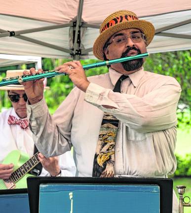 Rup Chattopadhyay plays the flute.
