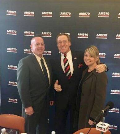 JP Beebe and Erika Lupo-Beebe with Joe Piscopo, at the AM970 broadcast studios in Manhattan.