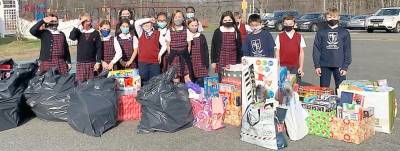 Students from Reverend Brown Elementary School donated hundreds of new, unwrapped toys to the 2020 Stuff the Stocking contest (Photo provided)