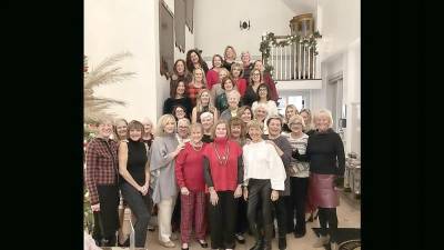 Members of the Lake Mohawk Golf Club Women’s Association pose for a group photo at the holiday party Dec. 7.