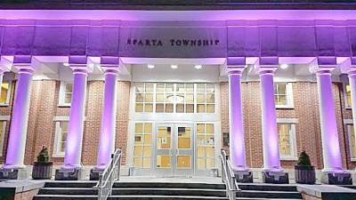 Sparta Township Hall was illuminated in purple on Feb. 14, 2020, in celebration of League of Women Voters Day.