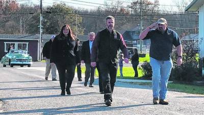 Sussex County Commissioner William Hayden, right, marches with other officials in the county’s 23rd annual Salute to Military Veterans on Nov. 5 at the Sussex County Fairgrounds. (File photo by Kathy Shwiff)