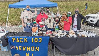Cub Scout Pack 183 sells baked goods at the Vernon Township Farmers' Market. (Photo courtesy Howard Burrell)