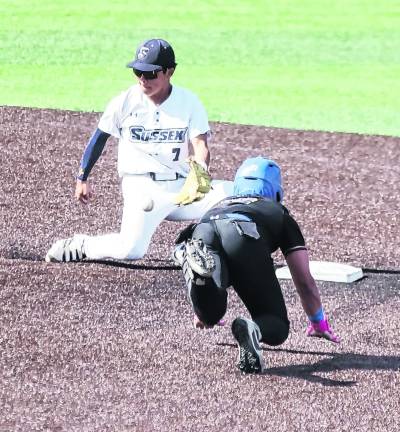 <b>Sussex Skylanders infielder Seiji Umezawa waits for the throw as Monroe Express runner Anthony Sanchez dives towards second base.</b>