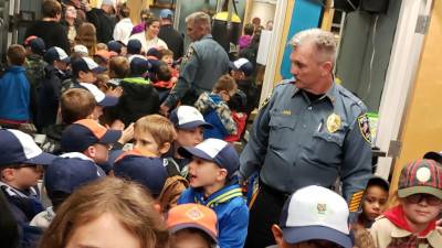 Sparta Police Lt John Lamon ensures that Cub Scout Pack 90 has a fun and educational visit to Sparta Police Headquarters on Wednesday, Nov. 6, 2019.