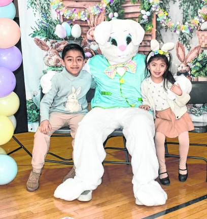 Christopher and Sarah Gordillo of Sparta poses wiith the Easter Bunny.
