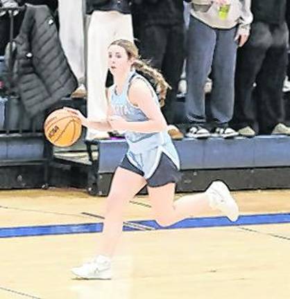 Sparta's Kaelyn Sabanosh dribbles the ball.