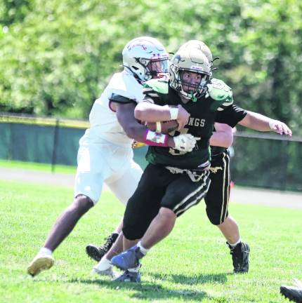 Sussex Tech running back Dane O'Malley carries the ball.