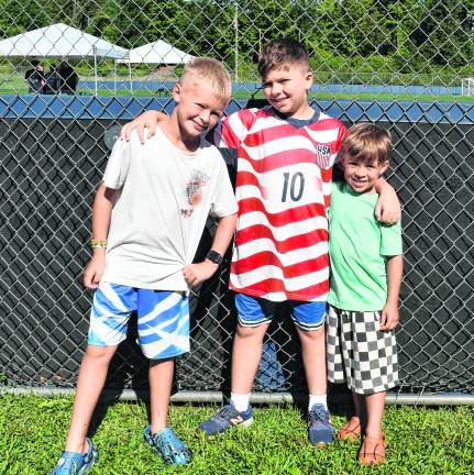 Daegon McMahon, Logan Muscarnero and Kaeson McMahon, all of Vernon, pose for a photo.