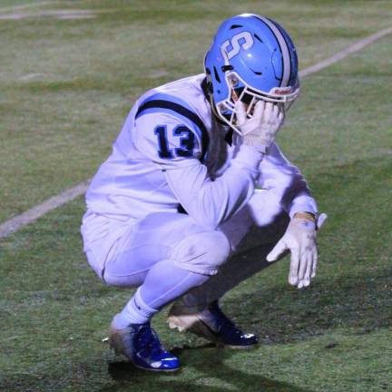 Number 13 slumps in disappointment as the clock runs out to declare a victory for Ramapo.