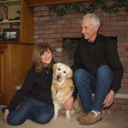 Joy and Fred Schmitz at home with Lily