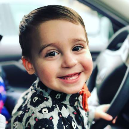 Handsome little guy. JC is rambunctious almost 2 year old. He loves to run, play with his cars and chase his pup Zoey! Photo courtesy of Ariana.