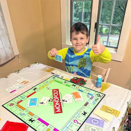 Jameson Murphy plays Monopoly.