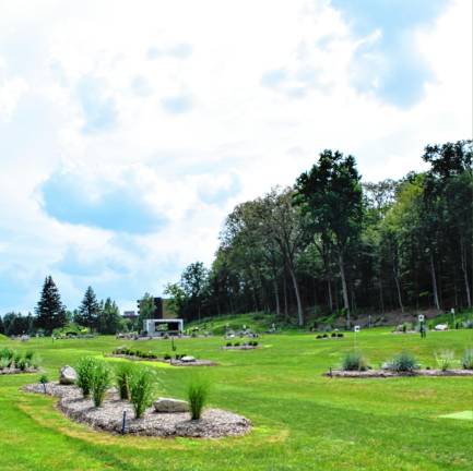 <b>A green tee box at each hole includes a brush tee to help position the ball before swinging. (Photo by Theresa Esposito)</b>
