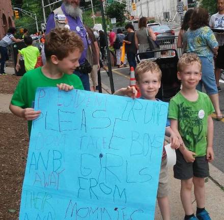 The Sommer children -- Leo, Kipplen, and Tillem -- who atteneded the June 22 Morristown demonstration with their mom, Julia Sommer Photo by Megan Byers