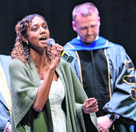 <b>Nadia Cameron, SCCC student, performs the National Anthem.</b>