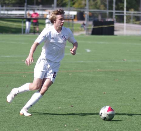 Newton's Jimmy McKeown approaches the ball.
