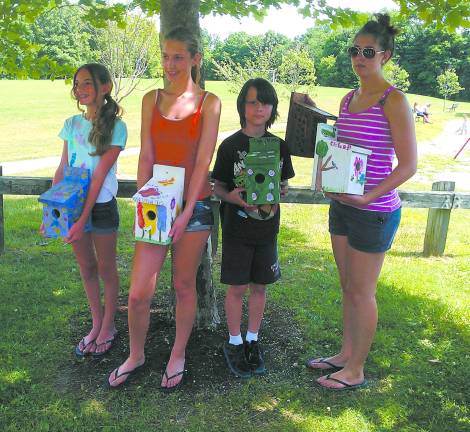 The 4H Club Members who attended the birdhouse hanging event Jordan Toll, Kassidy Wagner, Ethan Horn and Viktoria-Leigh Wagner.