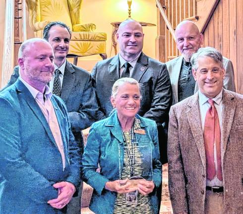 <i><b>At the luncheon, the award was received on behalf of the College by SCCC representatives. This group included Top Row, left to right: Business &amp; Economics Professor Sal Paolucci, Director of the Public Safety Training Academy John Dixon, and SCCC Trustee Chair Herb Yardley. First Row, left to right: Dean of Technical Occupations Jason Fruge, Vice President of Finance and Administrative Services Terry Pappan, and Executive Foundation Director Stan Kula.</b></i>