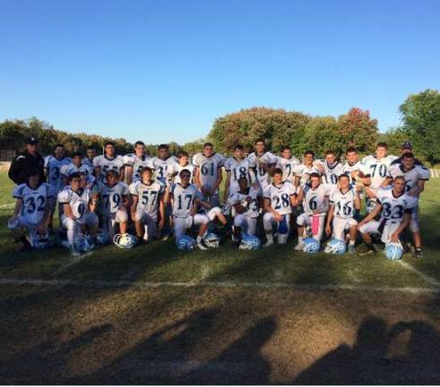 Sparta players collect cleats for needy