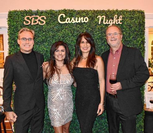 Rick and Natasha Koerner and Claudia Lavagnino and Marco Antonio, all of Sparta.