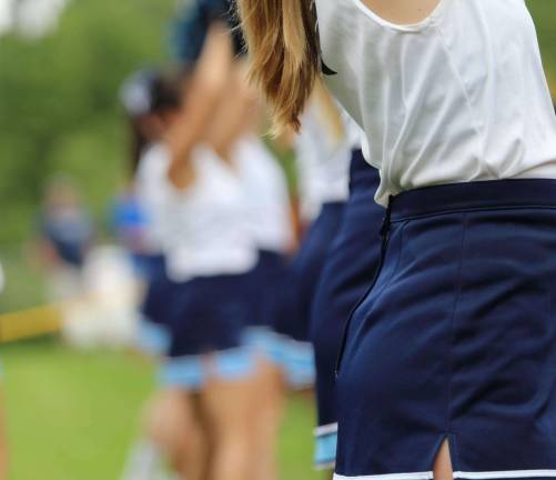 Cheerleaders were there on sunny days and rainy days to support the team and to lead fans in cheering on the team.