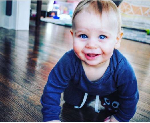 Our cute grandson playing at our house. He is always on the go but stops to hug us. Photo courtesy of Jody.