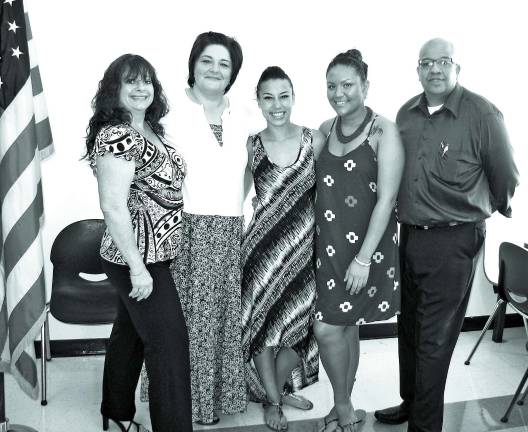 Pictured from left: Ellen Rochedieu of Sparta; Roberta E. Attalla of Sparta; Alexandra Cruz of Stanhope; Mercedes Mendez-James of Hopatcong; and Joseph Charleman, Chair of Dover Business College Surgical Technologist and Surgical Processing Technician programs. The students, who are currently enrolled in the Surgical Technologist program at Dover Business College, received pins during a recent ceremony.