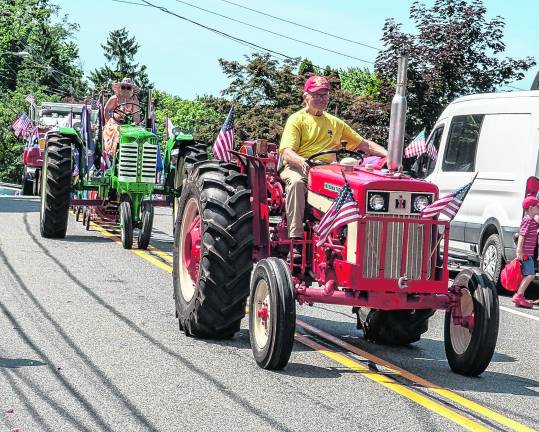 Antique tractors participated in the parade.