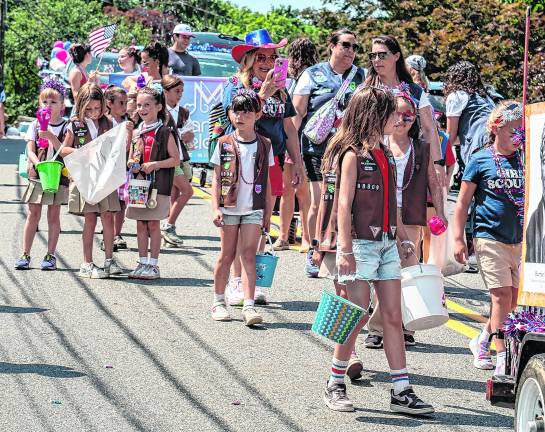 Girl Scouts march in the parade.
